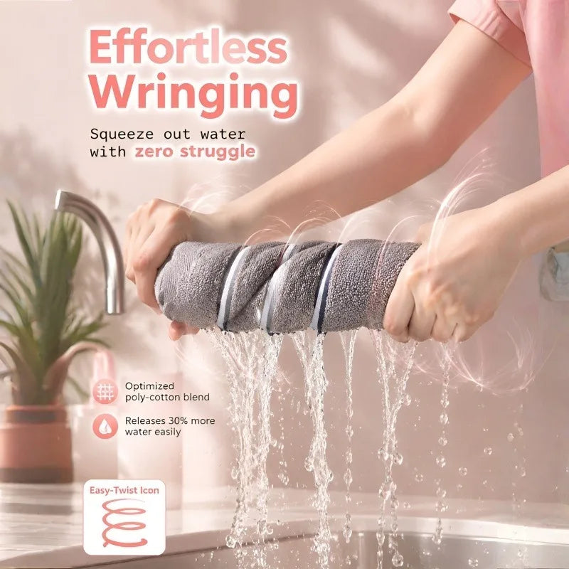 A hand is squeezing a bundle of gray face towels to remove water easily from the fabric.