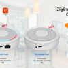 A white ZigBee Smart Gateway device is shown next to a black wireless hub and various smart home icons.