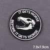 Black embroidered patch with white text IT GETS WORSE BEFORE IT GETS WORSE and a skull design