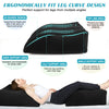Black inflatable leg elevation wedge pillow designed for ergonomic fit and support for legs.