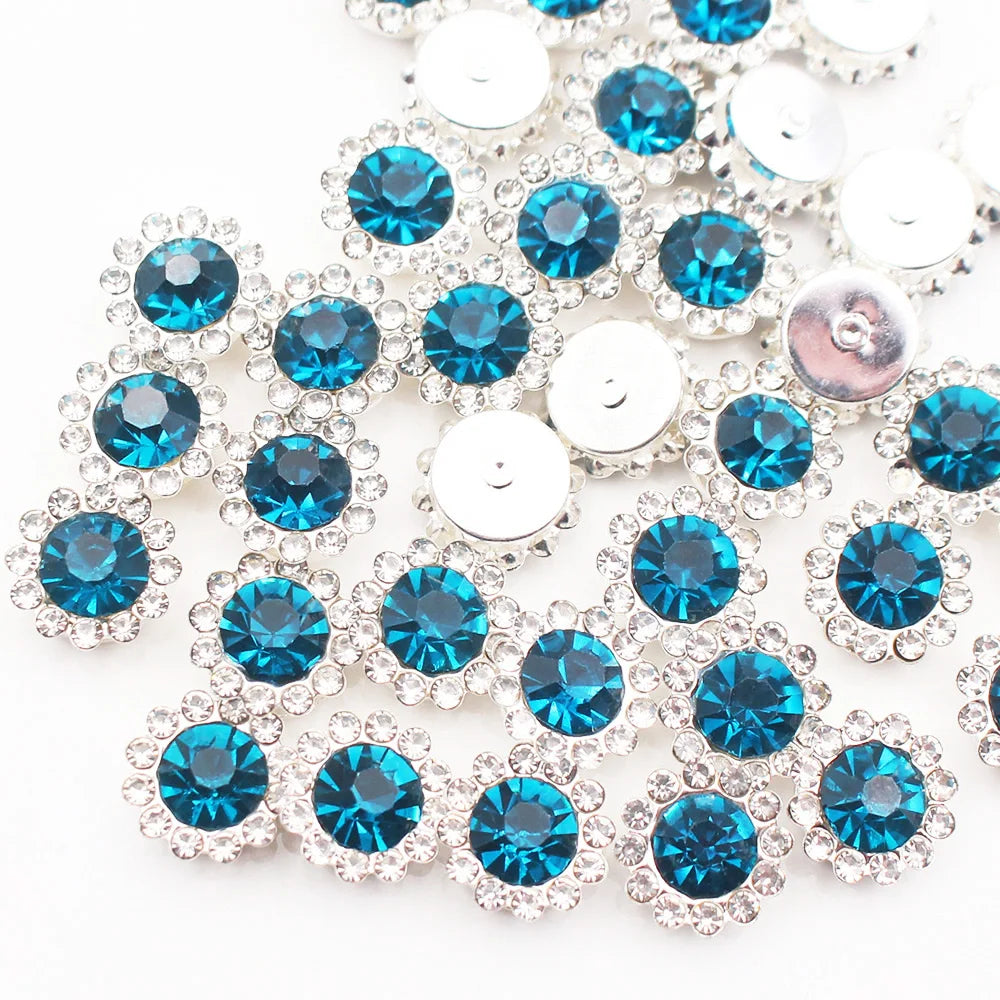 Silver and blue crystal rhinestone sew-on buttons arranged in a sunflower pattern