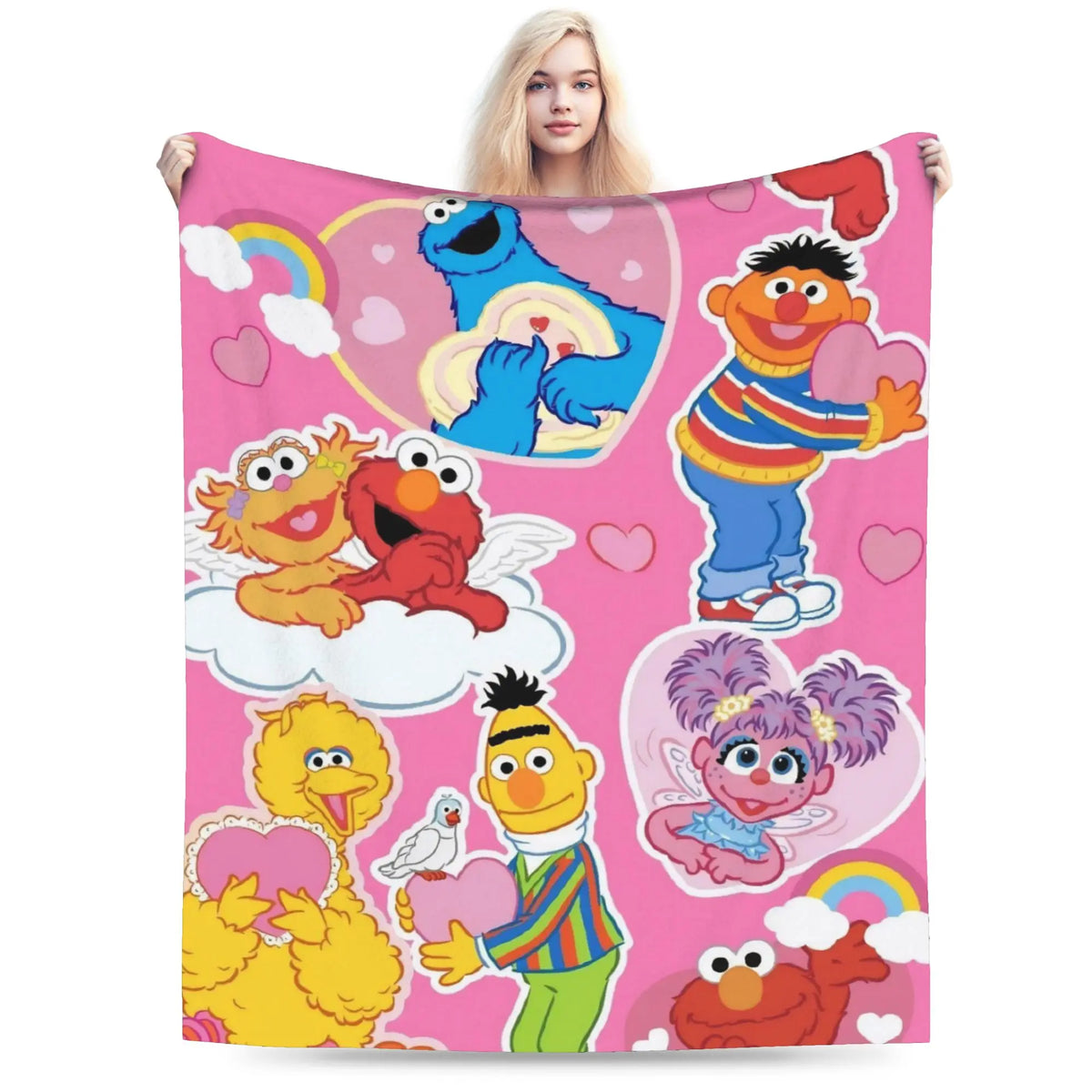 A pink flannel throw blanket featuring a cartoon design of Elmo and Friends characters.
