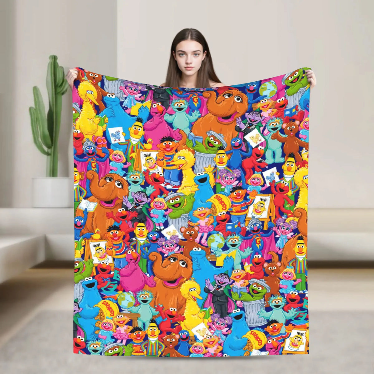 A colorful flannel throw blanket featuring characters from Sesame Street including Elmo and Friends