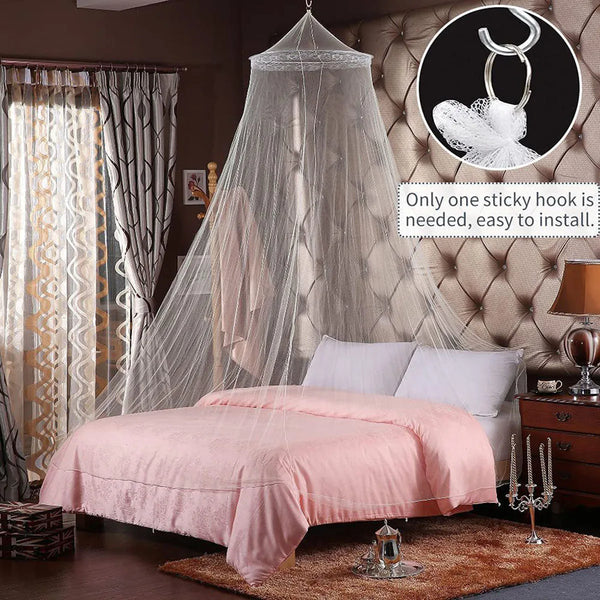 A sheer white mesh mosquito net draped over a bed for home decor