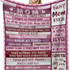A pink and purple flannel throw blanket featuring inspirational text for mom