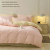 A pink duvet cover set with three pieces including a duvet cover, two pillowcases, and a pillow core.