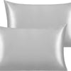 A pair of smooth, silver-gray silky satin toddler pillowcases.
