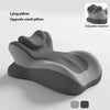 A gray ergonomic memory foam wedge pillow shown with an adjustable headrest feature.