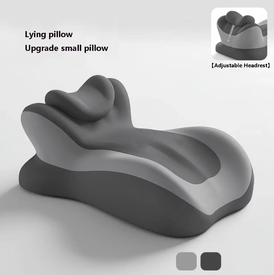 A gray ergonomic memory foam wedge pillow shown with an adjustable headrest feature.