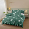 A dark green butterfly print duvet cover set displayed on a bed with white linens and wooden bedside tables.