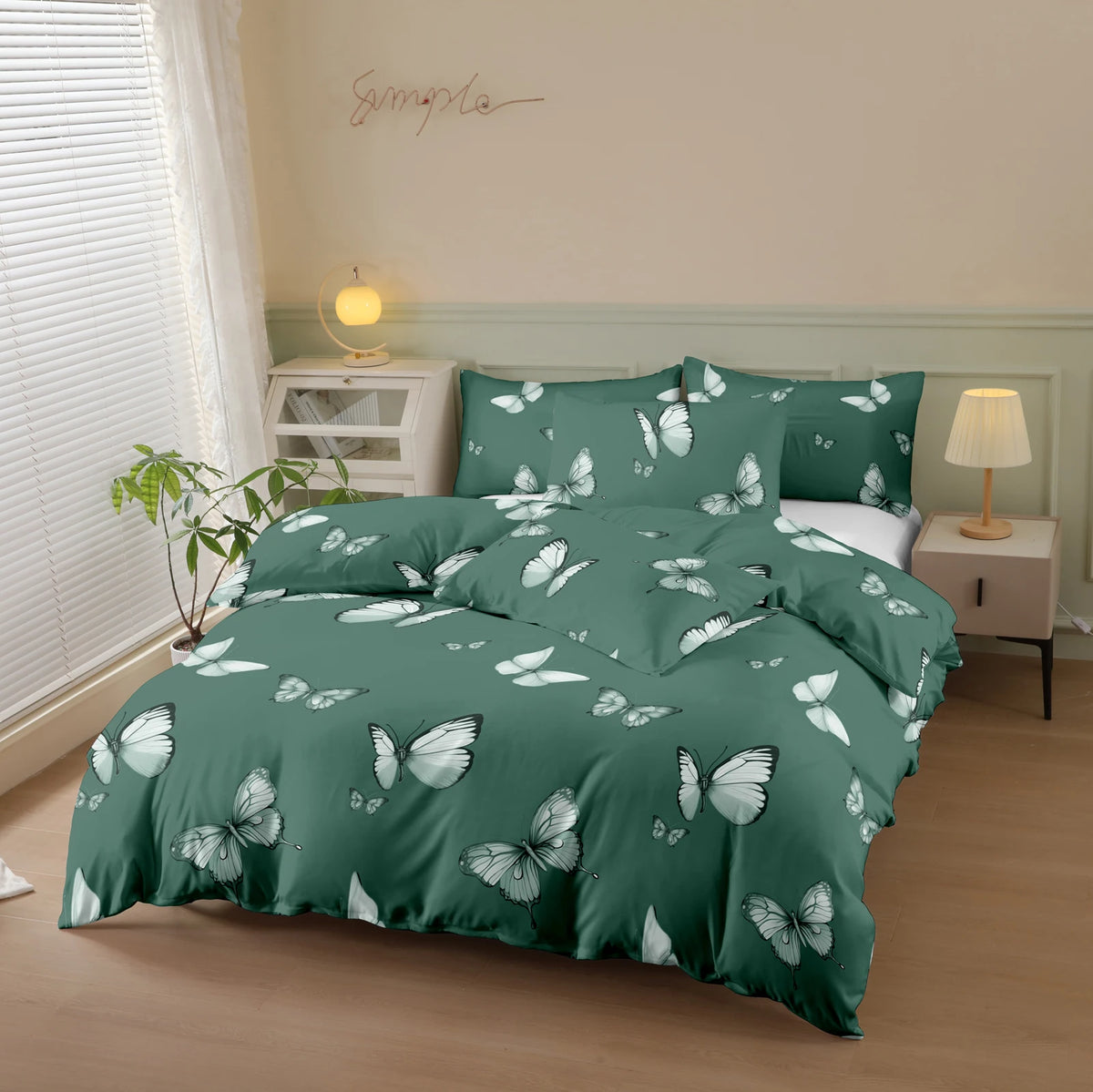 A dark green butterfly print duvet cover set displayed on a bed with white linens and wooden bedside tables.