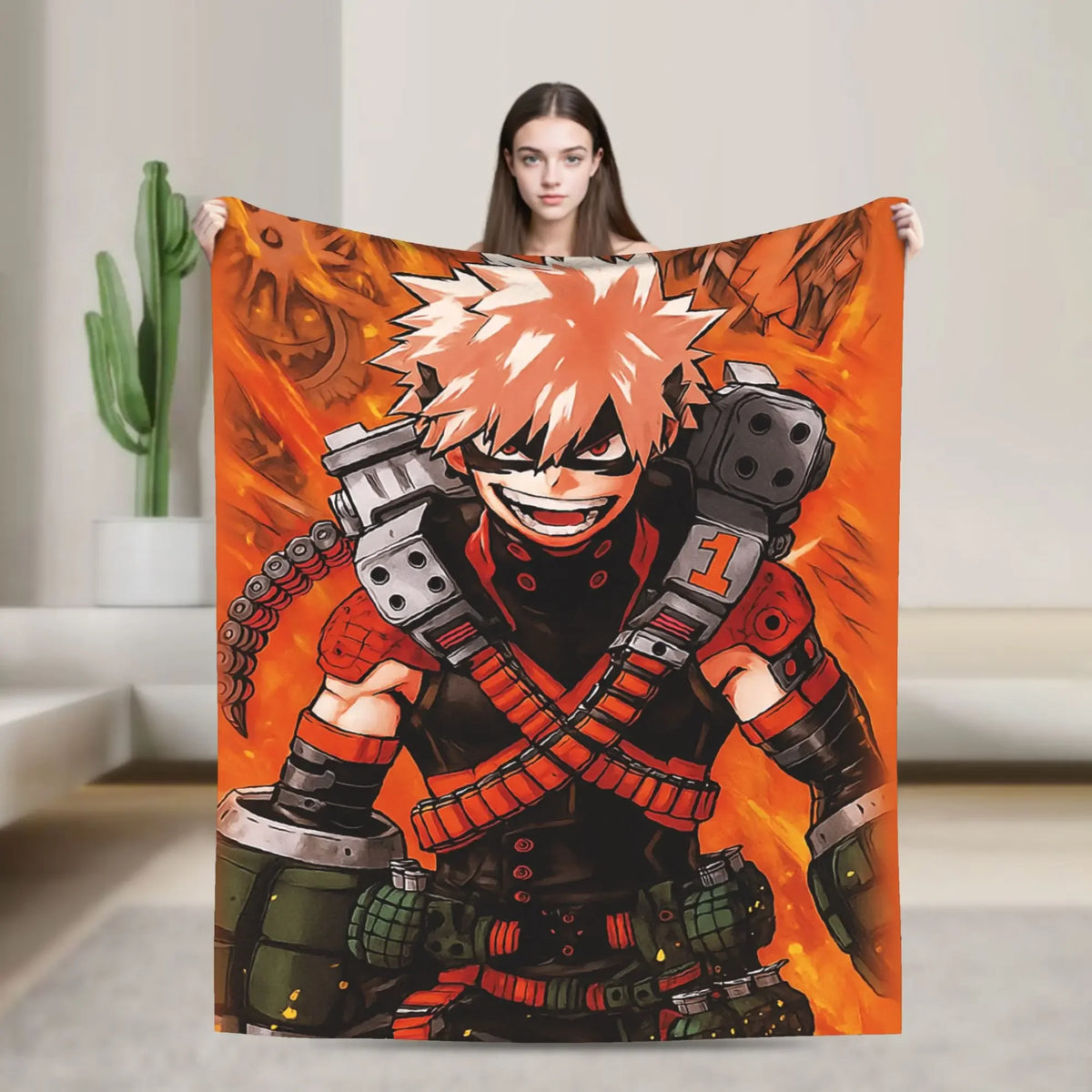 A person holds up a large blanket featuring an anime character in an orange and black outfit.