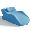 A light blue memory foam wedge pillow shown from the side, designed for back support and leg elevation.