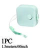 A light mint green retractable measuring tape with a clip and a thin cord.