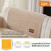A beige striped sofa cushion shown with dimensions and usage examples.