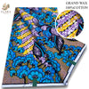 A bolt of blue and purple African wax print fabric featuring floral and abstract patterns.