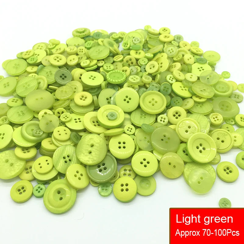 A pile of light green resin sewing buttons for crafting and DIY projects