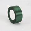 A roll of dark green satin ribbon measuring 4cm for crafts and gift wrapping.