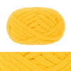 A ball of bright yellow hand-knitted wool yarn with a textured, ribbed pattern.