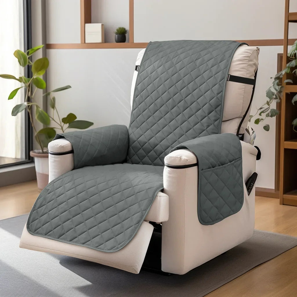 A gray washable recliner sofa slipcover with a white frame and anti-slip strap is shown on a floor.