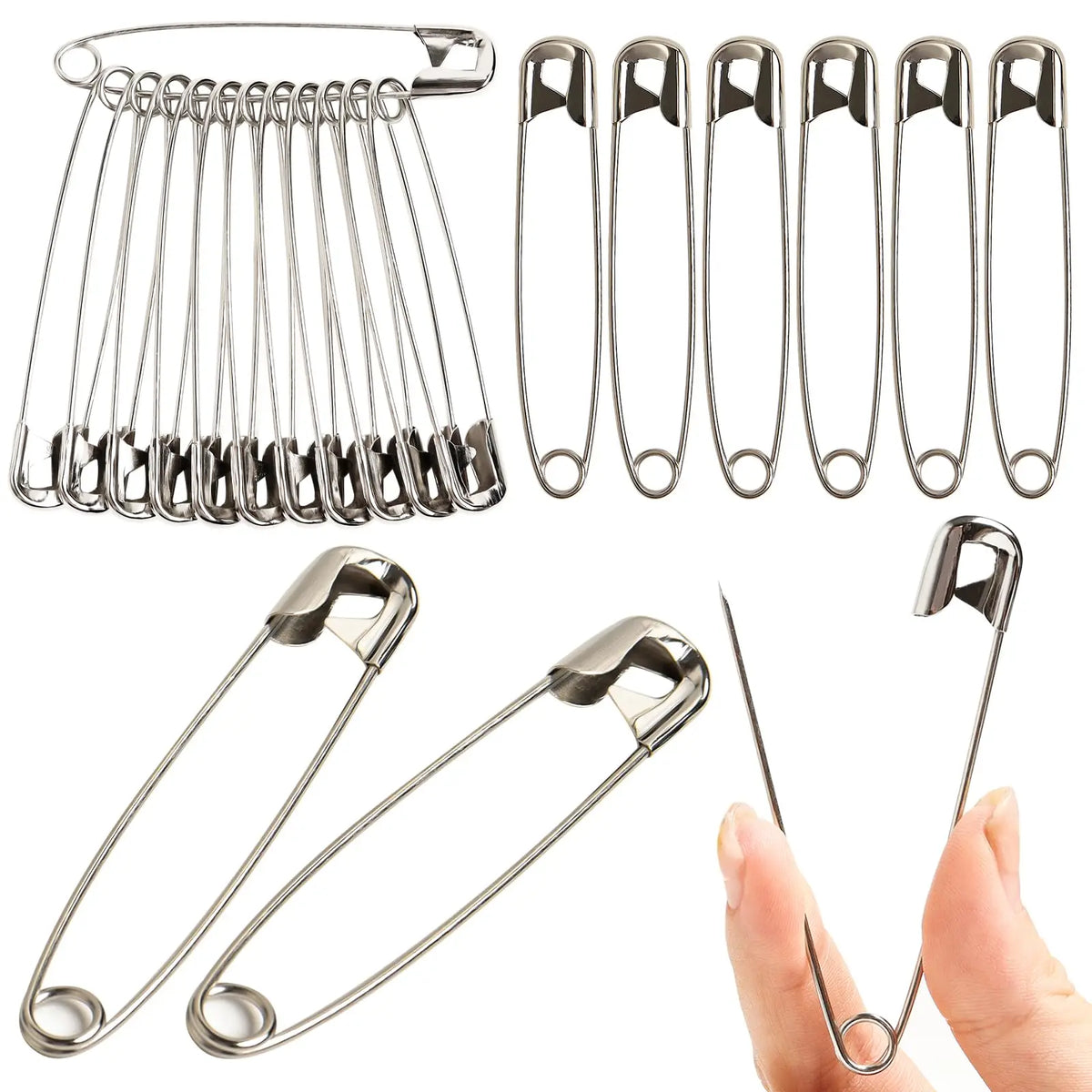 A collection of stainless steel safety pins in various sizes laid out for display.