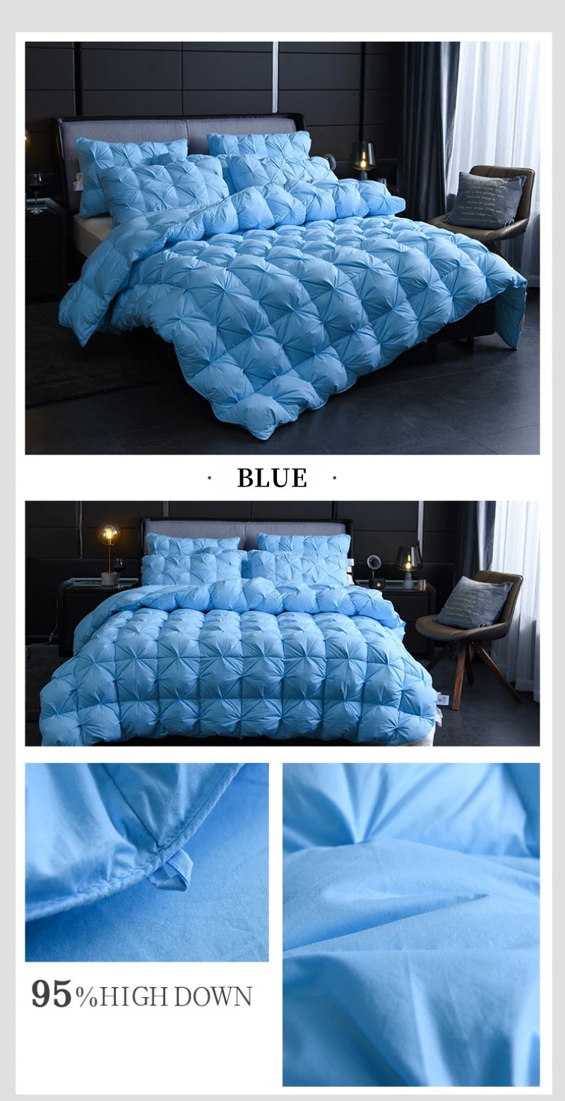 A light blue quilted duvet blanket with a diamond pattern displayed on a bed.