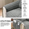 Gray quilted slipcover for a recliner sofa with a utility bag pocket and anti-slip strap