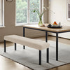 A light beige stretch jacquard dining bench cover placed under a modern wooden table in a bright room.