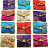A collection of multi-color silk brocade jewelry pouches in various floral patterns and colors.