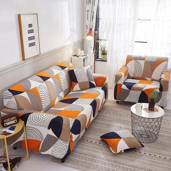 A modern living room features an orange and gray patterned sofa and armchair with sheer curtains.