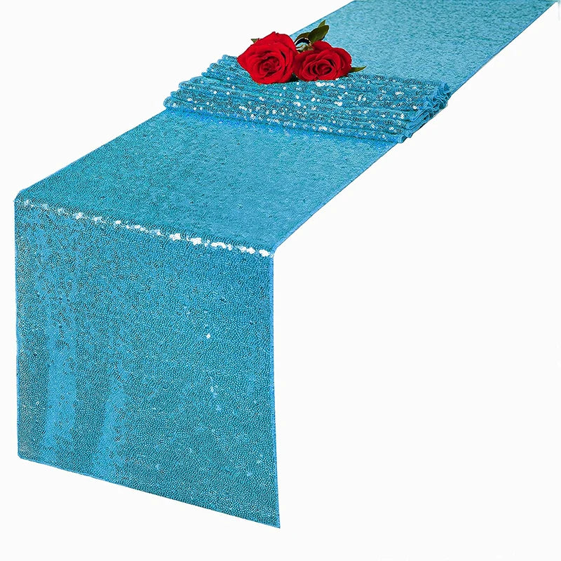 Blue sequin table runner with red roses for weddings and celebrations