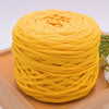 A ball of bright yellow craft yarn made of 100% polyester for knitting and DIY projects.