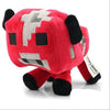 A red stuffed dragon plush toy with black accents and a white geometric face design.