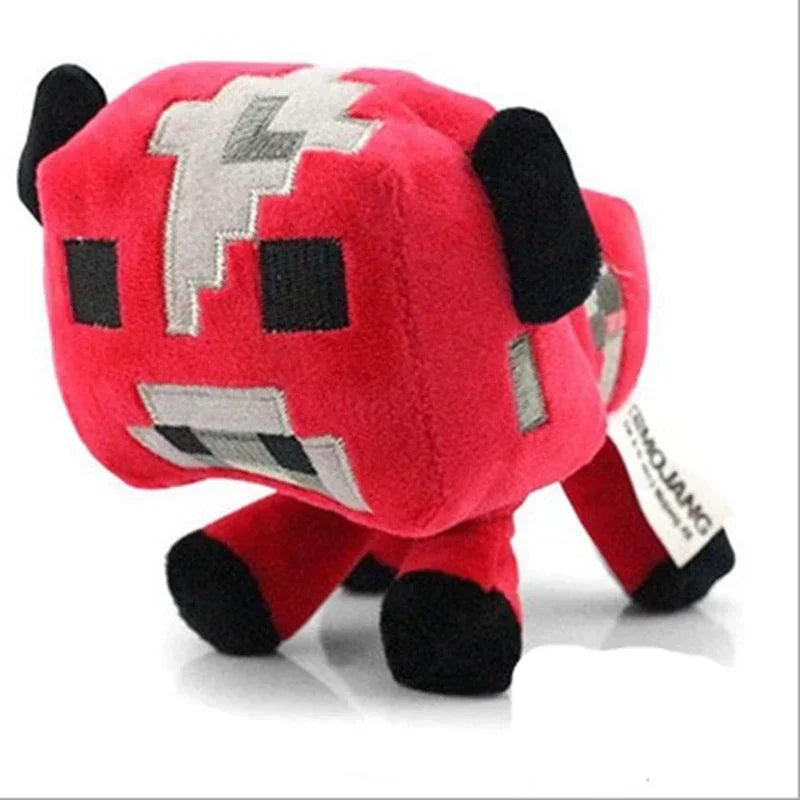 A red stuffed dragon plush toy with black accents and a white geometric face design.