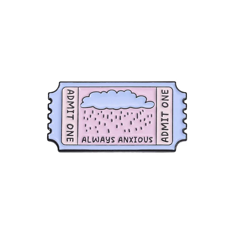 A lapel pin featuring a vintage enamel design with the text Admit One Always Anxious and a cloud pattern.