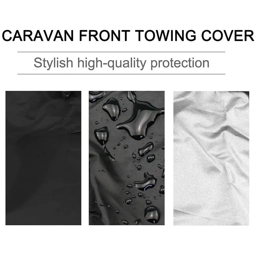 Close-up view of a black waterproof BBQ grill cover showing water droplets on the fabric.