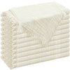 A stack of cream-colored decorative cloth napkins folded neatly.