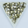 A heart-shaped arrangement of silver and clear crystal rhinestones for crafts and decor.