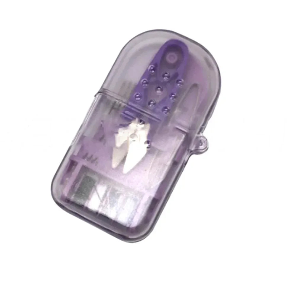 A clear plastic portable sewing kit containing thread and needles.