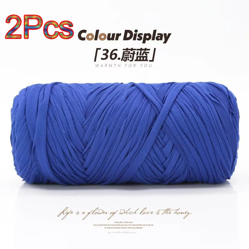 A skein of bright blue elastic yarn used for crafting and display.
