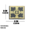 A square embroidered tactical patch with a gray design featuring four star shapes on a beige fabric.
