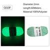 Green glow-in-the-dark polyester yarn with a black band, labeled G010F.