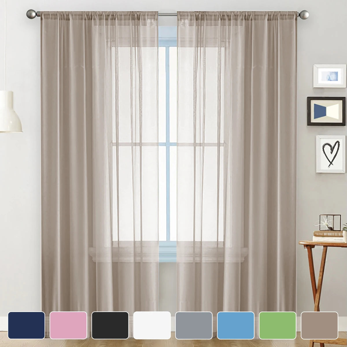 A set of modern sheer curtains in a taupe color hanging on a window, with various fabric swatches displayed below.