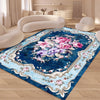 A deep blue carpet featuring an elegant floral pattern with pink and purple roses and greenery.