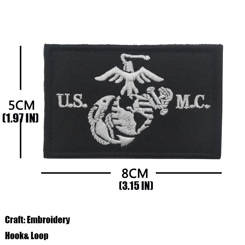 Black embroidered patch featuring the U.S. Navy Seal Team M.C. emblem.