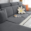 A gray polar fleece jacquard sofa seat cushion cover with an orange flower accent on a modern sofa.