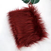 A deep reddish-brown faux fur plush fabric used for sewing and crafting.
