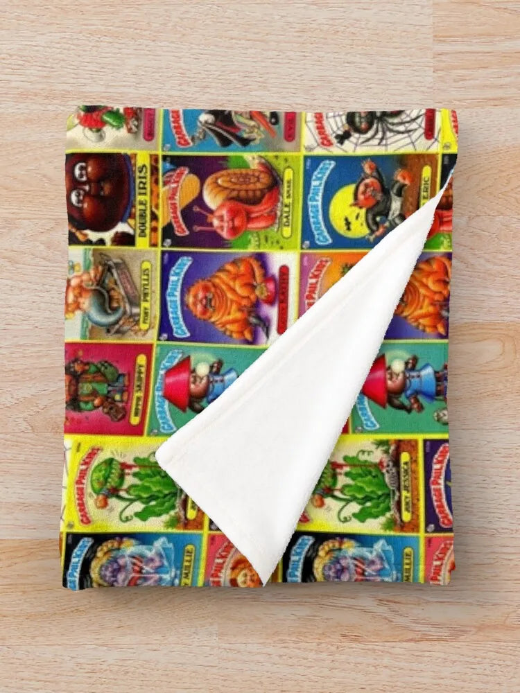 A colorful fabric swatch featuring various illustrations of wool sheep and related items.