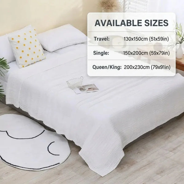 White pure cotton gauze throw blanket displayed on a bed with available size options listed.