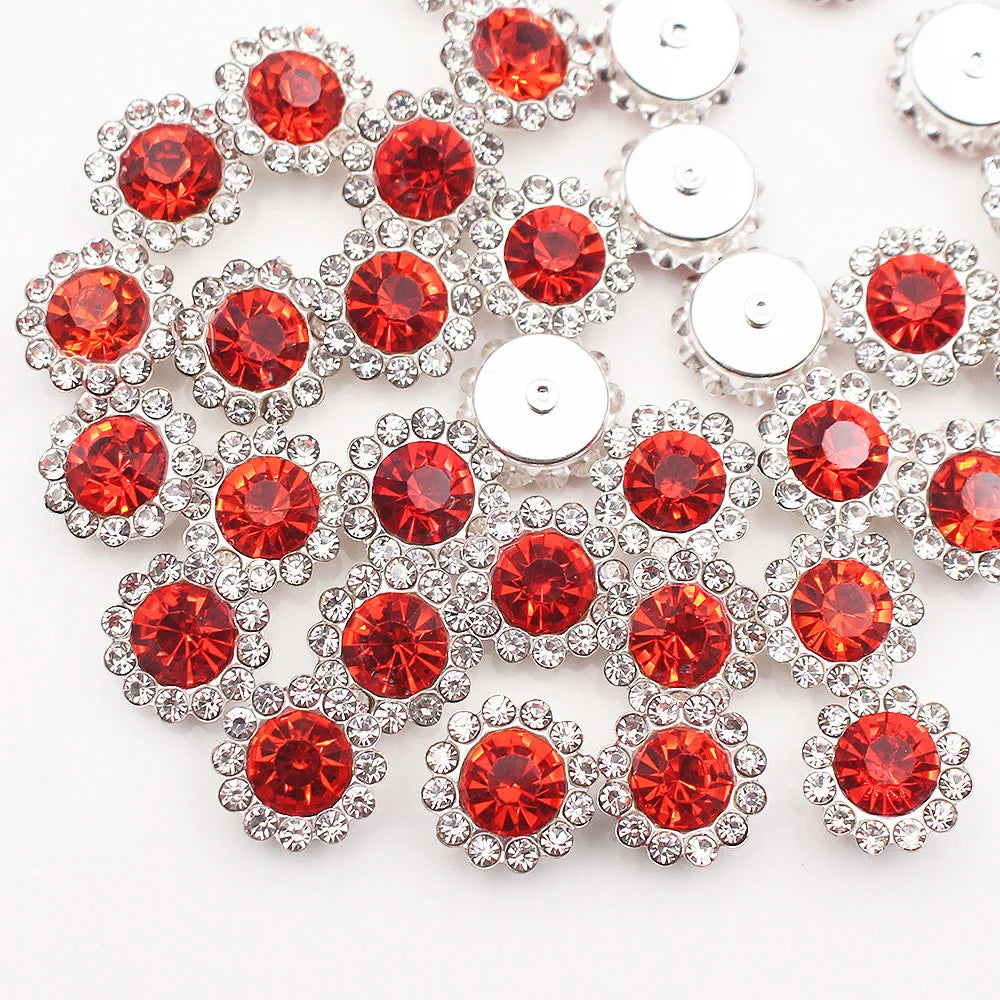 Silver and red crystal rhinestone sew-on buttons arranged in a floral pattern